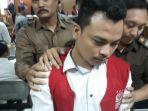 terdakwa-haris-simamora-usai-sidang-di-pengadilan.jpg