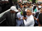 terdakwa-pelanggar-uu-ite-buni-yani-jalani-sidang-perdananya_20170614_011123.jpg