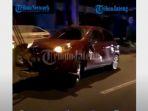 terjadi-kecelakaan-antara-motor-honda-beat-hitam-dan-mobil-nissan-march-merah.jpg