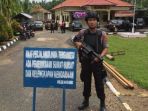 terjadi-penyerangan-oleh-orang-tidak-dikenal-di-polsek-maro-sebo_20180522_184805.jpg