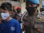 tersangka-drs-saat-berada-di-polres-bantul.jpg