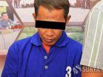 tersangka-mustofa-alias-musdalifa-saat-dikeler-di-mapolres-pasuruan.jpg