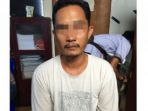 tersangka-pelaku-hb-saat-diamankan-mapolsek-bangko_20170719_075518.jpg