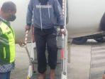 tersangka-penjualan-amunisi-ilegal-tiba-di-jayapura.jpg