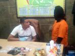 tersangka-rn-diamanakan-di-mapolresta-pekanbaru_20160323_121112.jpg