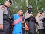tersangka-tohari-45-alias-mbah-slamet-di-lokasi-penemuan-mayat.jpg