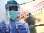 tes-covid-19-dengan-sampel-air-liur-pcr-saliva-based-testing_20210202_152224.jpg