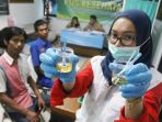 tes-kesehatan-dan-urine-para-pengemudi-angkutan-mudik_20180608_184655.jpg