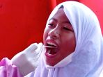 tes-swab-pcr-untuk-sukseskan-ptm-100-persen-di-kota-tangerang_20220519_124901.jpg