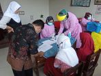tes-swab-pcr-untuk-sukseskan-ptm-100-persen-di-kota-tangerang_20220519_125427.jpg