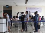 test-antigen-bagi-penumpang-bus-akap-di-terminal-pulo-gebang_20211221_165152.jpg