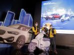 tiga-direktur-mandiri-hadiri-program-undian-livin-by-mandiri_20211013_160627.jpg