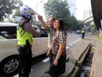 tilang-ganjil-genap_20180801_183827.jpg