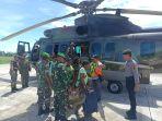 tim-gabungan-tni-polri-melakukan-evakuasi-terhadap-18-warga-kampung-alama-kabupaten-nduga.jpg