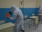 tim-inviguard-melakukan-proses-coating-cairan-anti-virus.jpg