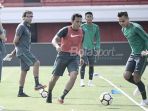 timnas-u-23-indonesia-luis-milla-dan-bima-sakti_20180725_143929.jpg
