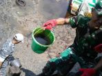 tni-bersihkan-teluk-balikpapan_20180721_051750.jpg