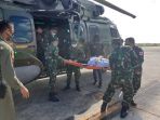 tni-evakuasi-anggota-tgpf-korban-penembakan-kksb-ke-jakarta_20201010_133229.jpg