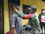 tni-gelar-bakti-sosial-bagikan-sembako-kepada-masyarakat-masamba_20200916_214320.jpg