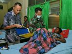 tni-memberikan-pelayanan-kepada-2027-warga-asmat_20180119_181947.jpg