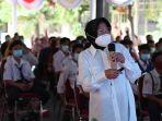 tri-rismaharini-beri-pengarahan-pada-siswa-yang-tertangkap-demo_20201019_220454.jpg
