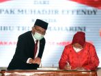 tri-rismaharini-hadiri-serah-terima-jabatan-menteri-sosial_20201223_204031.jpg