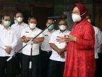 tri-rismaharini-hadiri-serah-terima-jabatan-menteri-sosial_20201223_205115.jpg