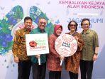 tri-rismaharini.jpg