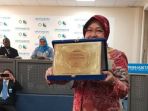 tri-rismaharini_20181001_235001.jpg