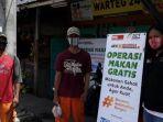 tribunnewscom-dan-act-bagi-nasi-bungkus-gratis_1.jpg