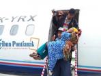trigana-penumpang_20141231_110652.jpg