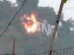 tulisan-raksasa-padang-di-puncak-gunung-padang-kota-padang-sumatera-barat-terbakar.jpg