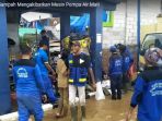 tumpukan-sampah-mengakibatkan-mesin-pompa-air-mati_20180207_160152.jpg