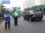 uji-coba-ganjil-genap-di-tol-tangerang-2_20180417_155534.jpg