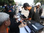 uji-coba-tilang-uji-emisi-di-jakarta_20230825_171438.jpg