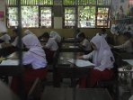 ujian-sekolah-sd-di-pekanbaru_20150518_164856.jpg