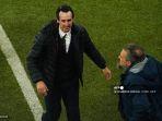 unai-emery-kiri-merayakan-kemenangan-timnya-di-akhir-final-sepak-bola-liga-eropa.jpg