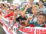 unjuk-rasa-pembunuhan-eno-parihah_20160607_123456.jpg