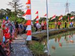 upacara-bendera-17-agustus-di-kolam-kampung-wonolopo-semarang_20210816_200435.jpg