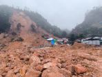 upaya-evakuasi-korban-longsor-pertambangan-emas-gorontalo_20240712_232027.jpg
