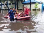 update-banjir-jakarta-jumat-siang-ada-4-rt-yang-masih-terendam-banjir-ketinggian-air-capai-40-cm.jpg