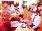 vaksinasi-covid-19-anak-6-11-tahun-di-bandar-lampung_20211220_155235.jpg