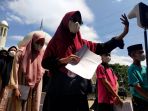 vaksinasi-covid-19-kyai-dan-santri-di-ponpes-nurul-iman-bandung_20210831_182806.jpg