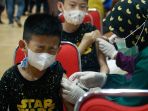vaksinasi-covid-19-untuk-anak-usia-6-11-tahun-di-batam_20211219_185306.jpg