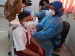 vaksinasi-covid-19-untuk-anak-usia-6-hingga-11-tahun-di-jakarta_20211214_144414.jpg
