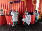 vaksinasi-covid-19-untuk-lansia-secara-drive-thru_20210303_191751.jpg
