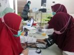 vaksinasi-tenaga-kesehatan-di-pmi-kota-tangerang_20210211_180727.jpg