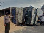 video-viral-beredar-di-mana-sebuah-truk-terguling-di-jalan-raya-cikande-rangkasbitung.jpg