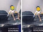 viral-anak-dihukum-ayahnya-duduk-di-bagasi-kereta-foto.jpg