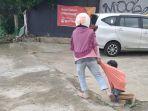 viral-istri-seret-suami.jpg